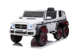 Macchina elettrica per bambini Mercedes-Benz G63 AMG 6X6, monoposto, bianco, 6 ruote con sospensioni indipendenti, guida 4 motori da 45 W, batteria 12V10AH, ruote e sedile in plastica, telecomando, con licenza