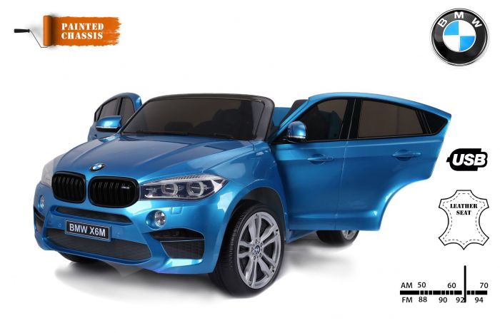 Bmw X6 M Macchina Elettrica Per Bambini Blu Dipinto Due Posti In Pelle Con Licenza Originale Alimentato A Batteria Sportelli Apribili Freno Elettrico 2x Motore Batteria 12v10ah Telecomando 2 4 Ghz Ruote Soft