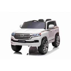 Automobile elettrica Toyota Landcruiser 12V, BIANCA, sedile in similpelle, batteria 12V/7AH, sportelli apribili, motore 2 x 35W, telecomando 2.4 Ghz, ruote in EVA morbida, sospensione, avviamento graduale, lettore MP3 con ingresso USB/AUX, licenza