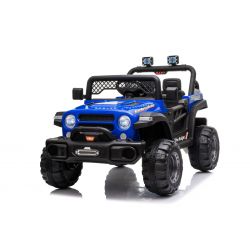 Auto elettrica All Ride con trazione posteriore, blu, batteria 12V, telaio alto, sedile largo, sospensione sull'asse posteriore, telecomando 2,4 GHz, lettore MP3 con USB, luci LED